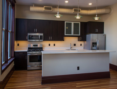 The Lofts, apartments at Steely Block, downtown revitalization, Waterloo, Iowa, kitchen