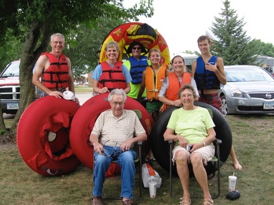 Family enjoying tubing, Charles City, Iowa